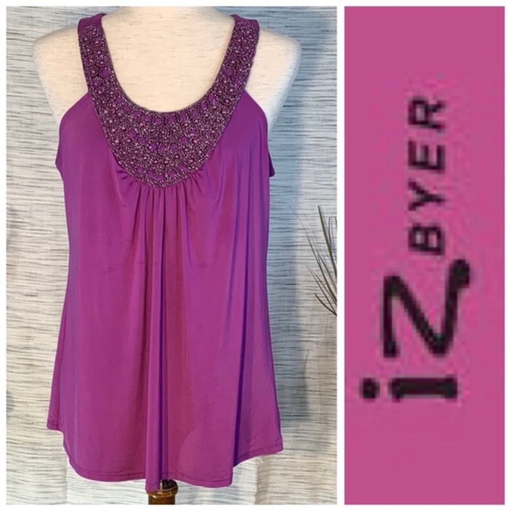 Iz Byer purple sleeveless pullover top.